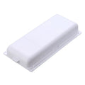 White plastic adhesive under-table storage drawer box with a grid-pattern lid