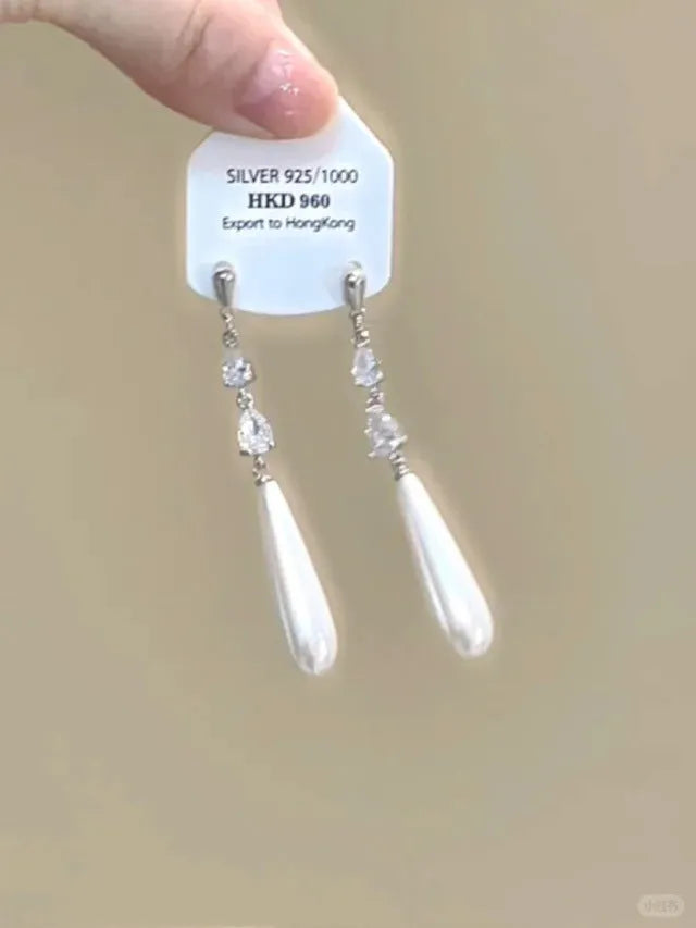 Geometric gold electroplated alloy ear clip jewellery with rhinestone and little stars tassel decoration