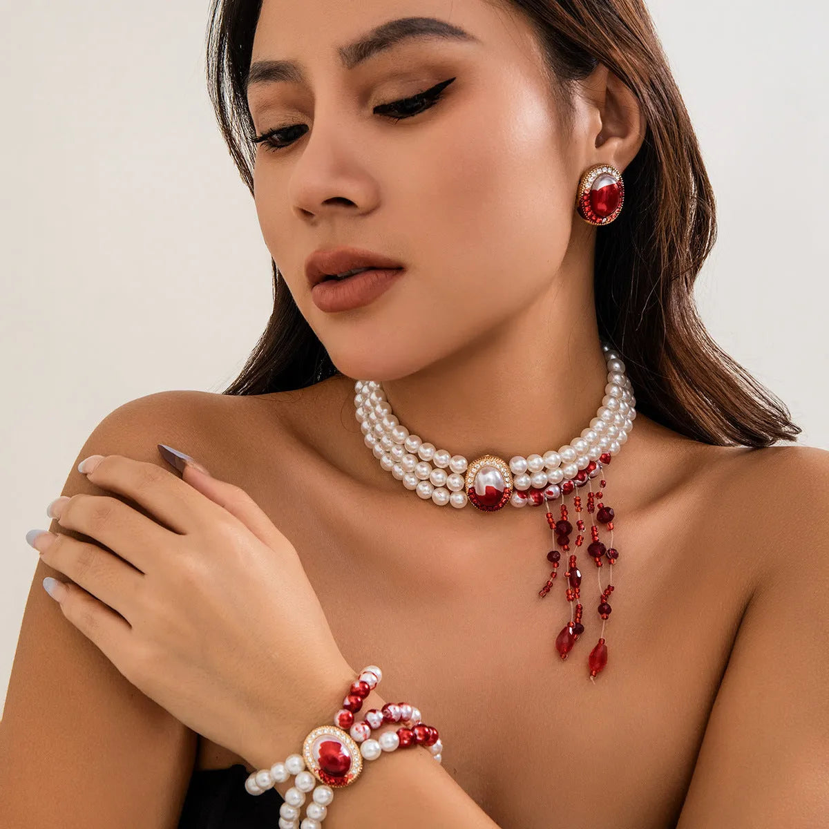 Halloween pearl collar necklace, stud earrings, and bracelet set in electroplated gold finishes.