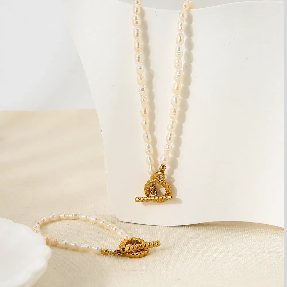 Women's adjustable freshwater pearl necklace and bracelet set with geometric stainless steel pendant
