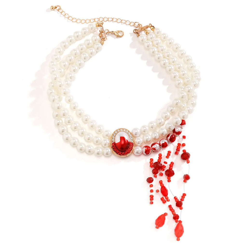 Halloween pearl collar necklace, stud earrings, and bracelet set in electroplated gold finishes.