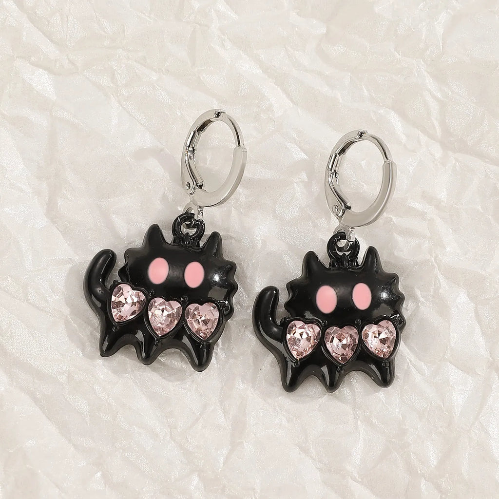 Women's alloy earrings with cross and heart designs in five colour variations including white, black cat, and antique silver