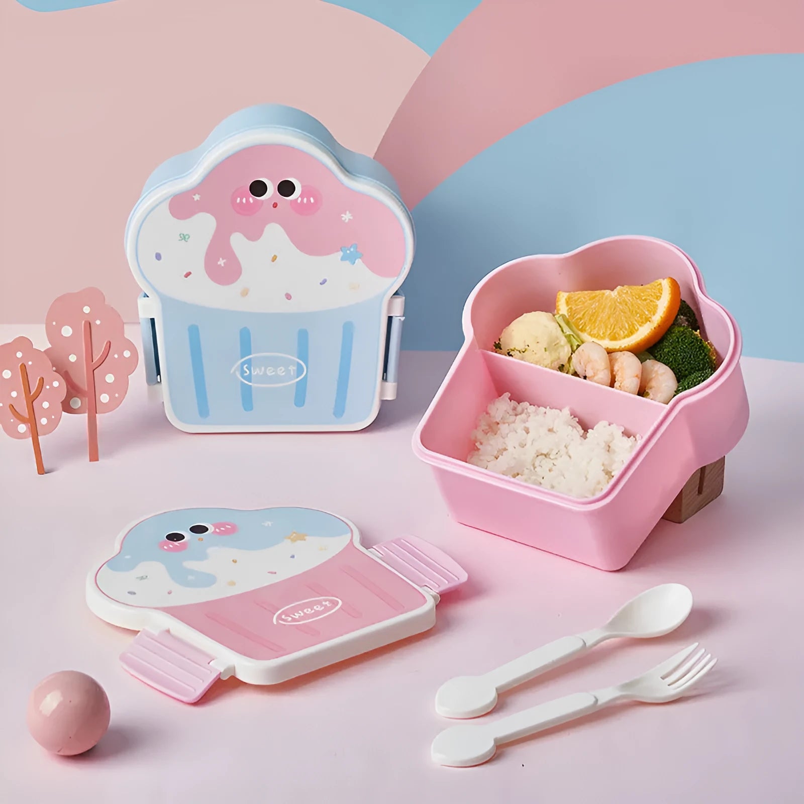 Pink and blue ice cream shaped plastic lunch box with compartments and included utensils
