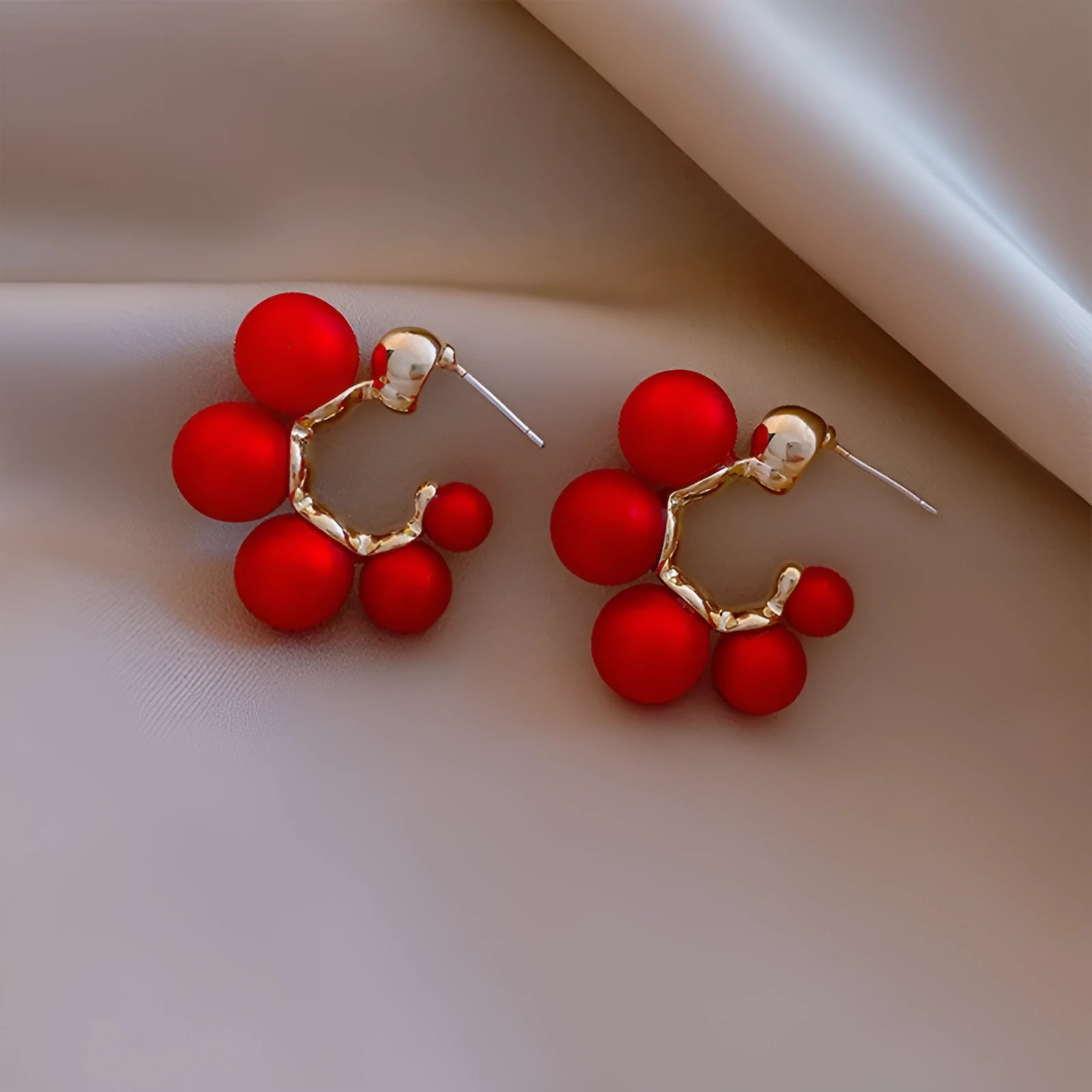 Red bell earrings for women with alloy construction also available in white