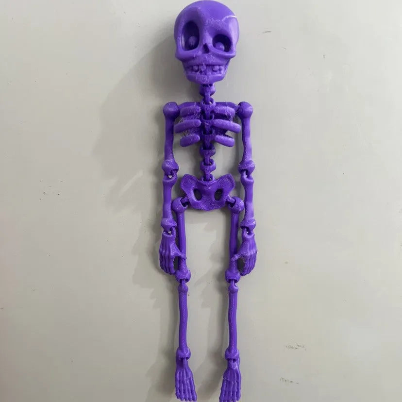 3D printed PLA plastic skull refrigerator magnet in modern art style, 18cm tall.