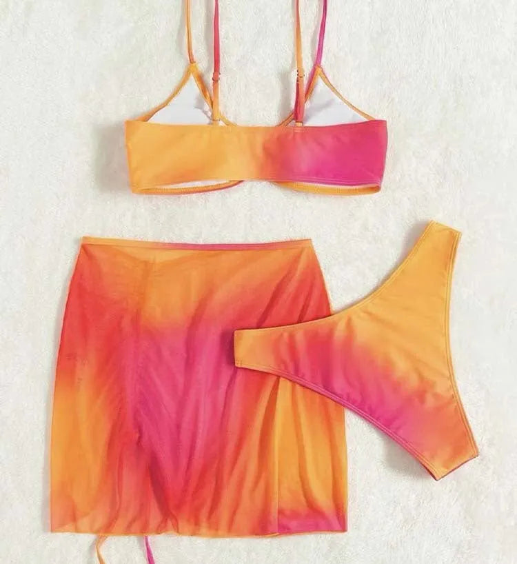 Orange gradient print women's three-piece bikini with hollow suspenders and a loop buckle.