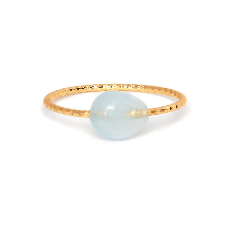 Geometric niche design agate ring for women showing eight colour variations on display