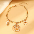 Spiral donut gold alloy necklace bracelet earrings set on display with electroplated finish