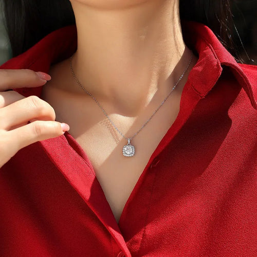 925 silver moissanite cube sugar pendant on ball bead chain against neutral background