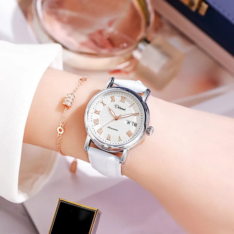 Women's automatic mechanical fashion watch with steel bracelet and white dial showing 12mm thickness