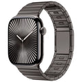 Stainless steel Apple Watch strap with magnetic buckle in business style, showing silver colour option