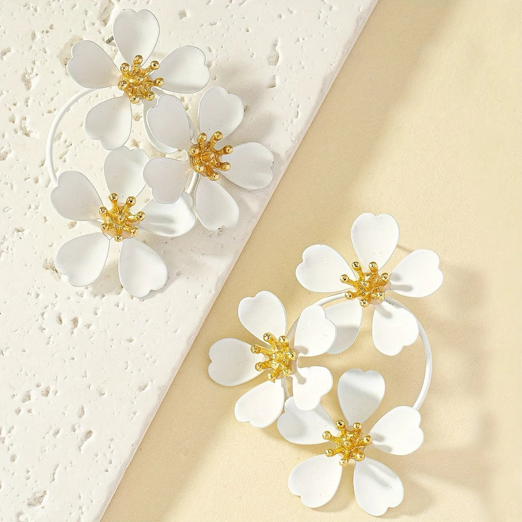 Retro flower-shaped iron earrings for women in black or white with European-American styling