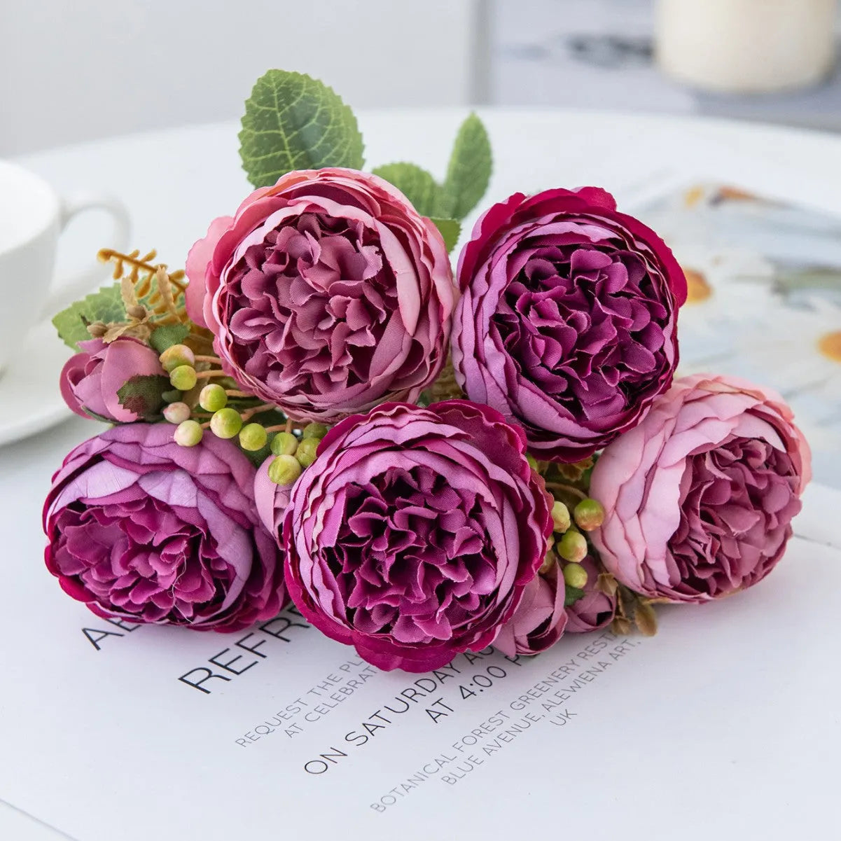 Silk artificial peony flower bouquet in champagne colour for home or wedding decoration.
