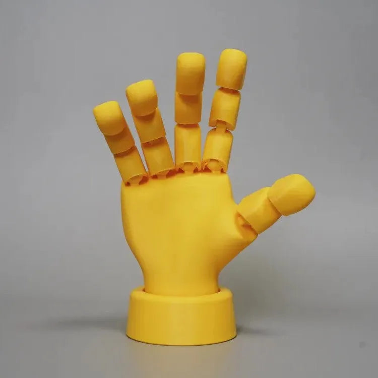 Yellow movable joint hand prop ornament made from PLA plastic.