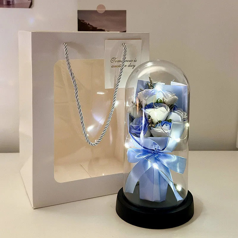 Bionic bouquet artificial flower arrangement in a reusable tote bag, showing gradient blue colour option.