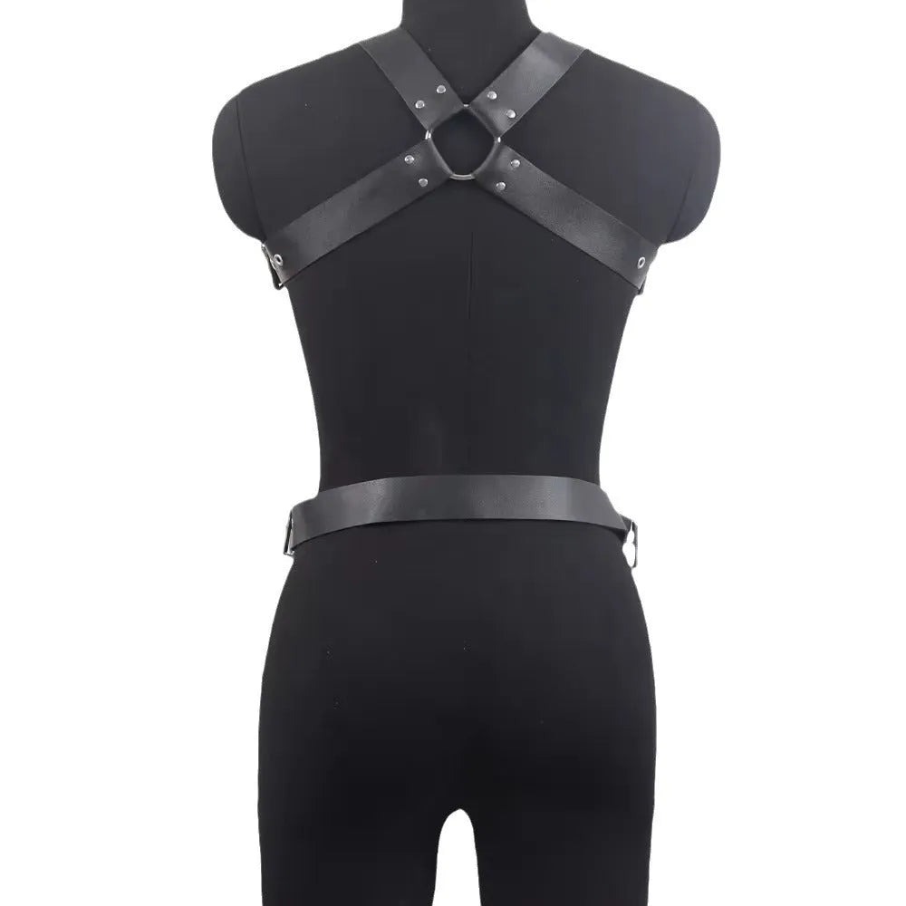 Black patent leather finish shapewear bodysuit with thin straps and a front pin buckle closure.