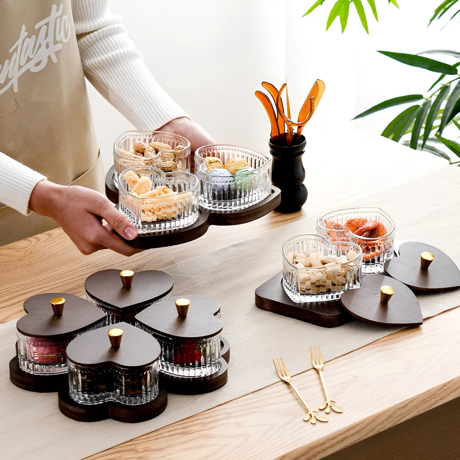 Glass fruit platter with transparent heart-shaped lids in mild luxury retro style with coloured glaze finish