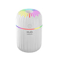 Small animal-shaped USB aromatherapy humidifier in green, pink, or white with a compact plastic design.