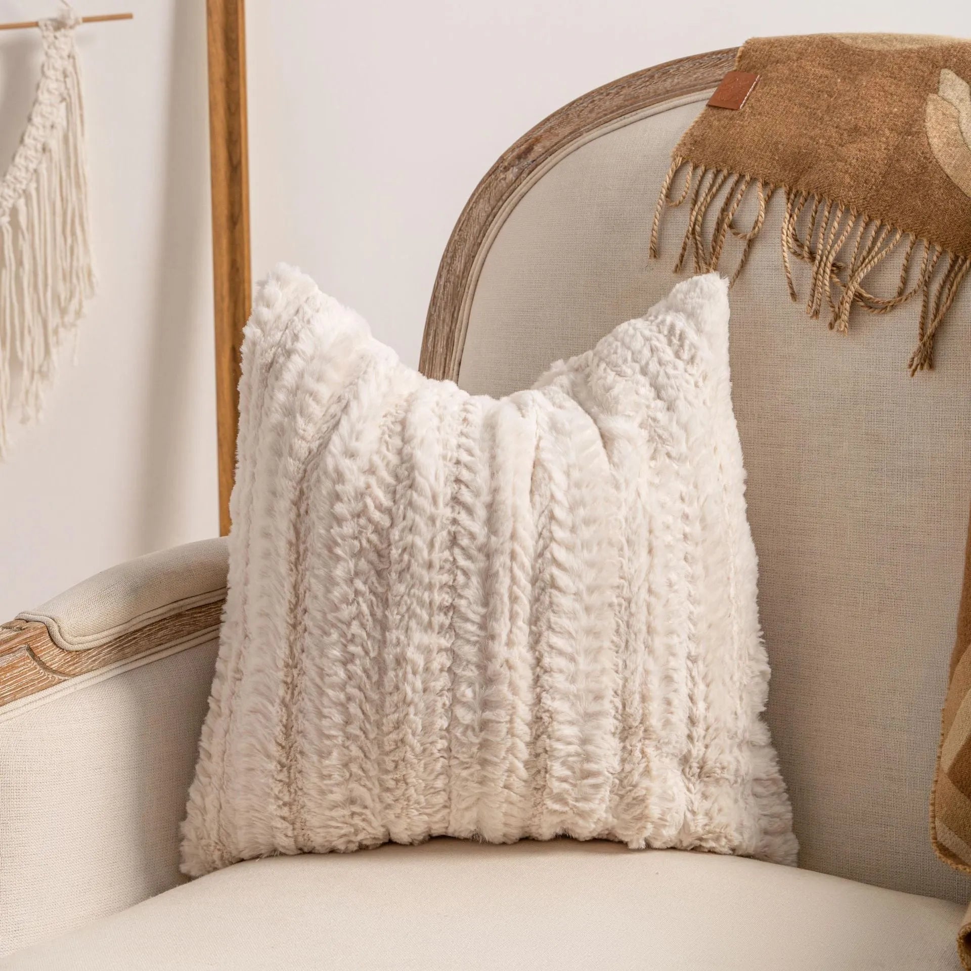 Decorative striped cushion cover with knitted tassel in a choice of six patterns and two sizes.