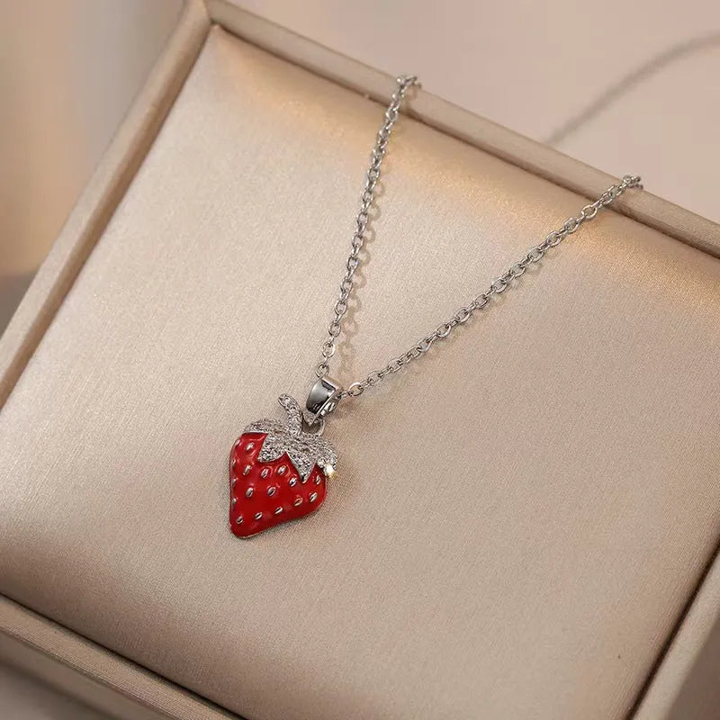 Golden indie necklace with detailed cherry, strawberry, and pepper pendant on a titanium steel O-ring chain.