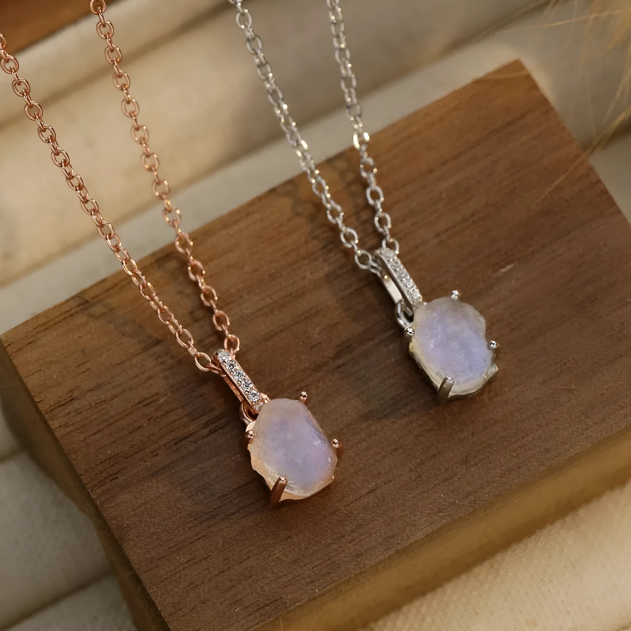Sterling silver necklace with geometric crystal moonstone pendant on adjustable curb chain