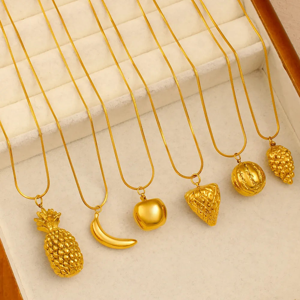 Stainless steel fruit necklace with colourful charm pendant showing six different fruit designs
