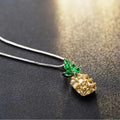 Silver geometric pineapple diamond necklace on white background