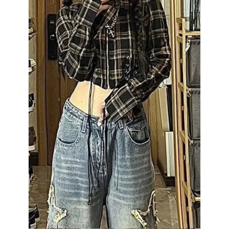 Blue women's high-waisted straight-leg denim jeans on a neutral background.