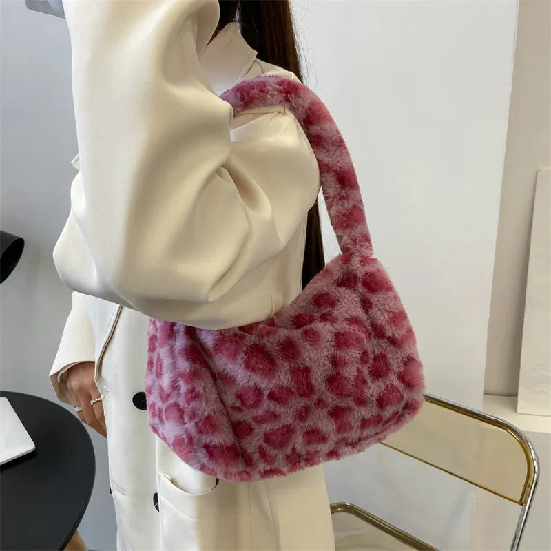 Plush retro shoulder bag in zebra print with single strap and polyester lining