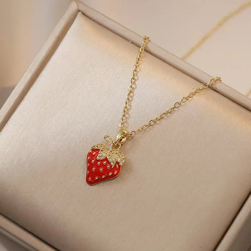 Golden indie necklace with detailed cherry, strawberry, and pepper pendant on a titanium steel O-ring chain.
