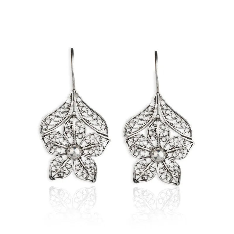 Silver hollow flower leaf-shaped women's earrings with geometric openwork floral pattern