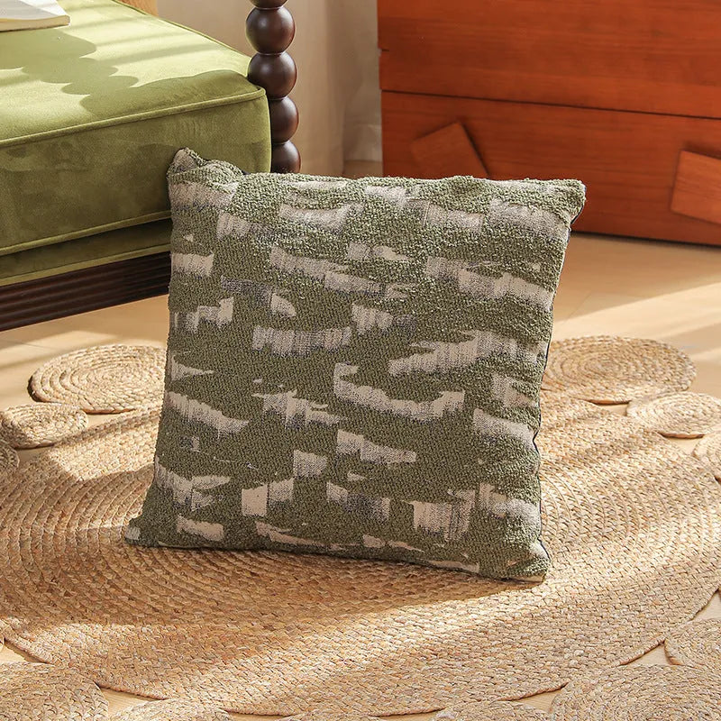 Close-up of a beige and green floral Jacquard woven cushion cover with textured pattern, 45cm square.