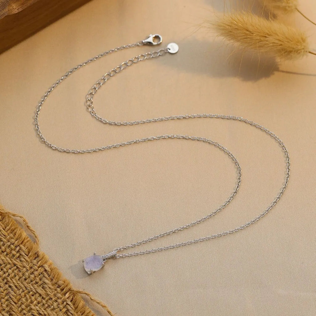 Sterling silver necklace with geometric crystal moonstone pendant on adjustable curb chain