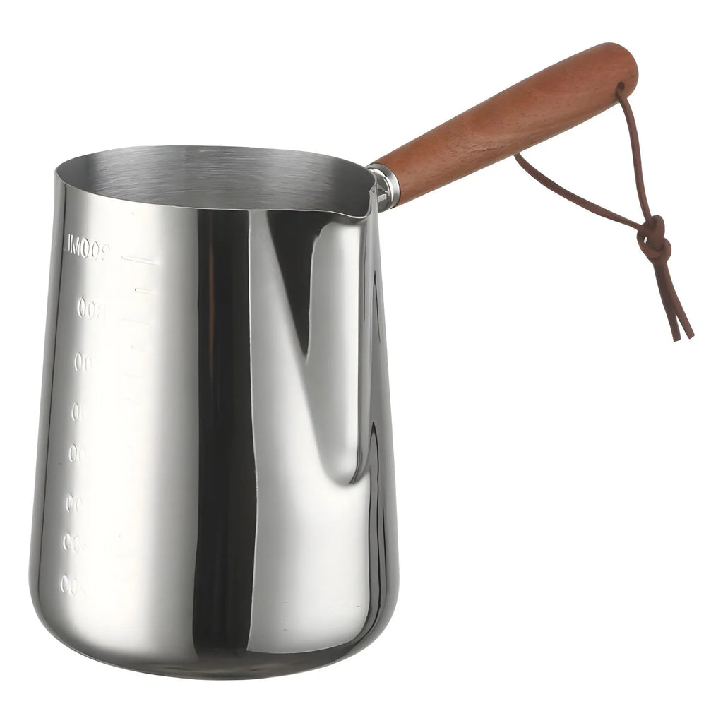 Stainless steel latte art milk cup with wooden handle and interior measuring scale