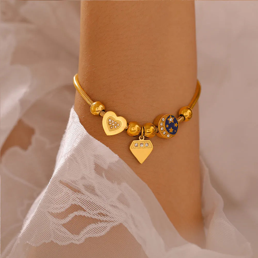 Gold stainless steel women's bracelet with heart-shaped geometric drop oil design on chain