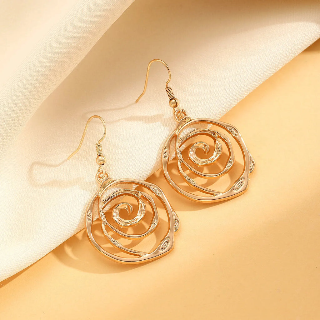 Spiral donut design jewellery set with necklace, bracelet and earrings in gold electroplated alloy
