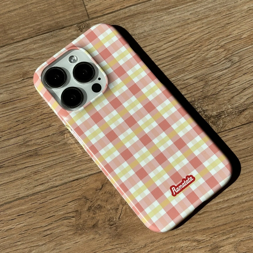iPhone 15 Pro Max phone case with red and orange plaid design on glossy and frosted feilin shells.