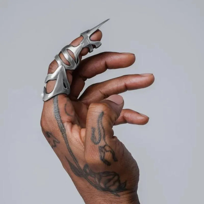 Silver alloy punk armour finger stall fashion ring on a finger