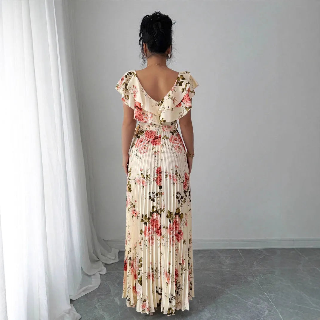 Apricot floral print women's dress with V-neck, ruffle sleeves, and a high-waisted swing skirt.