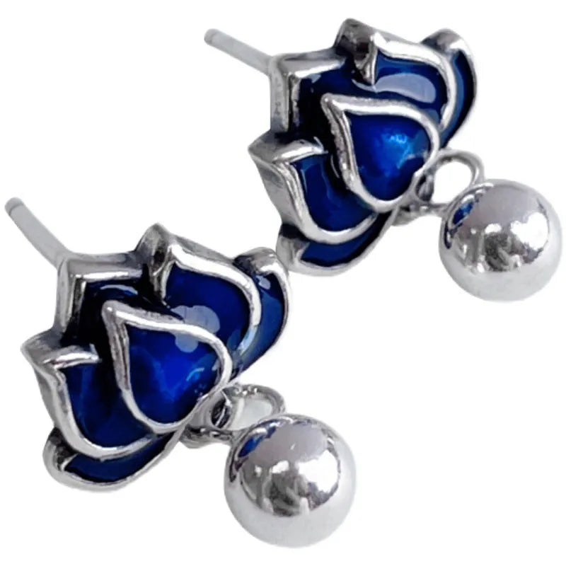 Blue lotus earrings with retro artistic design and lotus seedpod tassel, measuring 1.2cm wide
