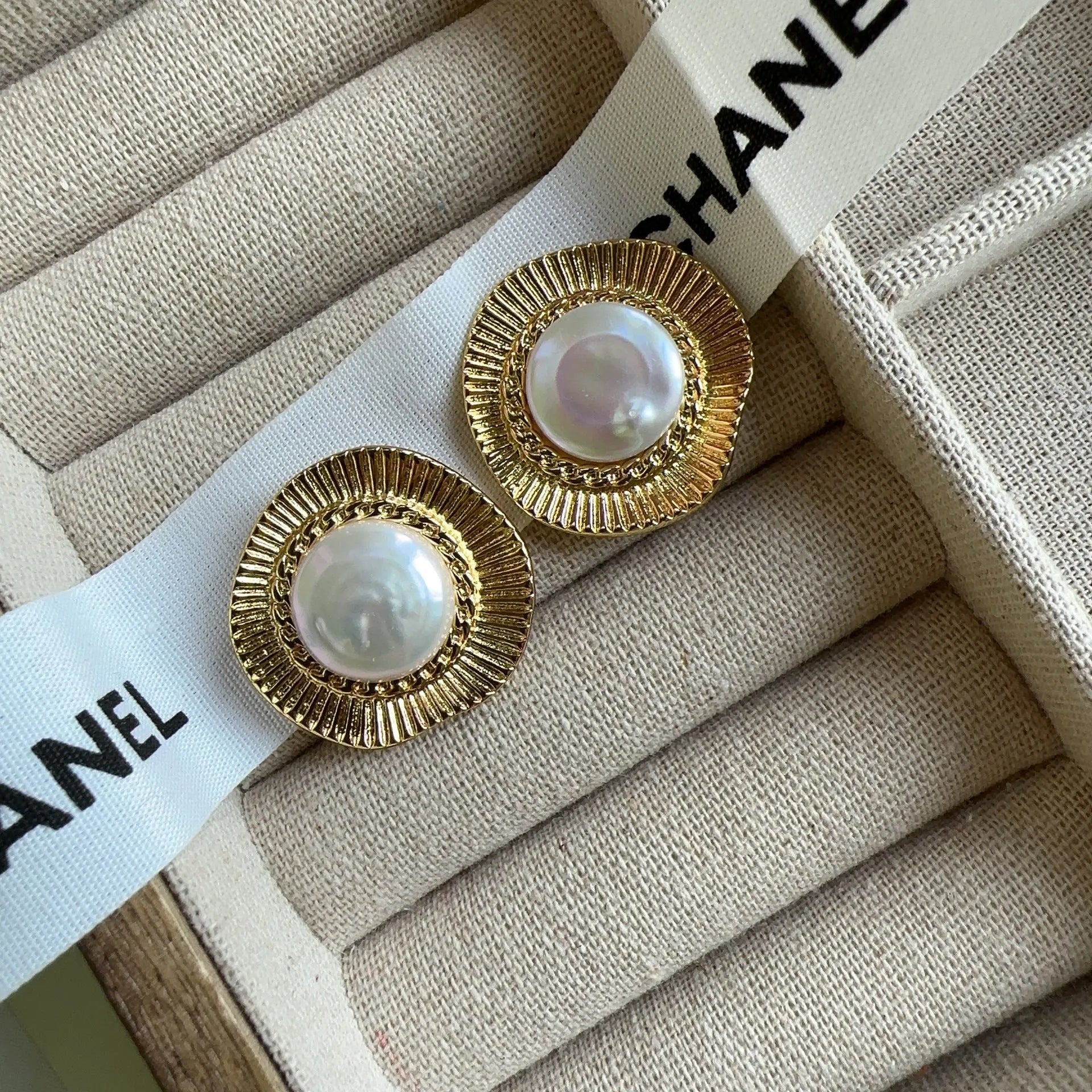 Gold electroplated metal earrings with French retro style and round design for women