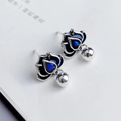 Blue lotus earrings with retro artistic design and lotus seedpod tassel, measuring 1.2cm wide