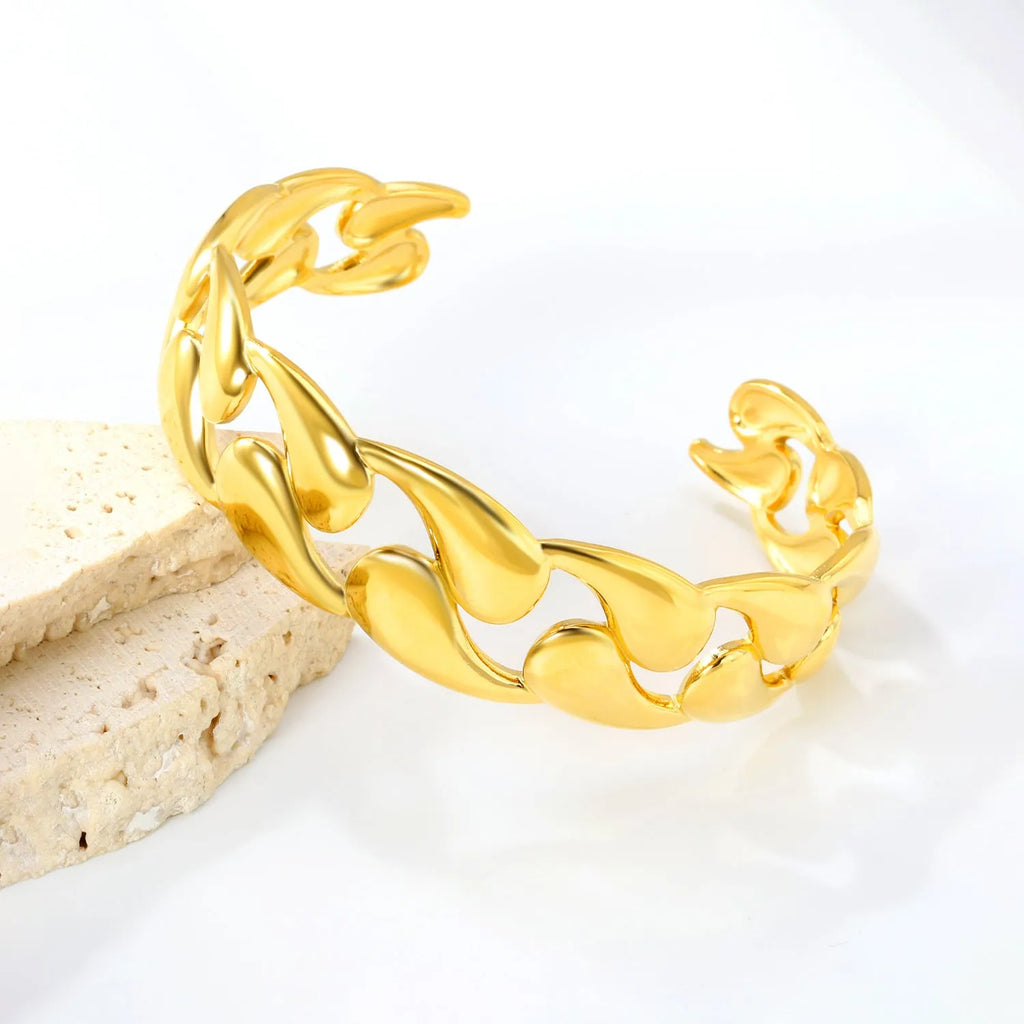 Advanced style stainless steel alloy bracelet in a minimalist European trend design on a wrist.