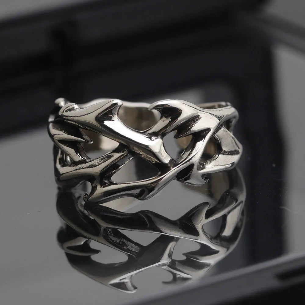Thorn unisex adjustable copper ring with geometric flower design in J2150 thorns colour