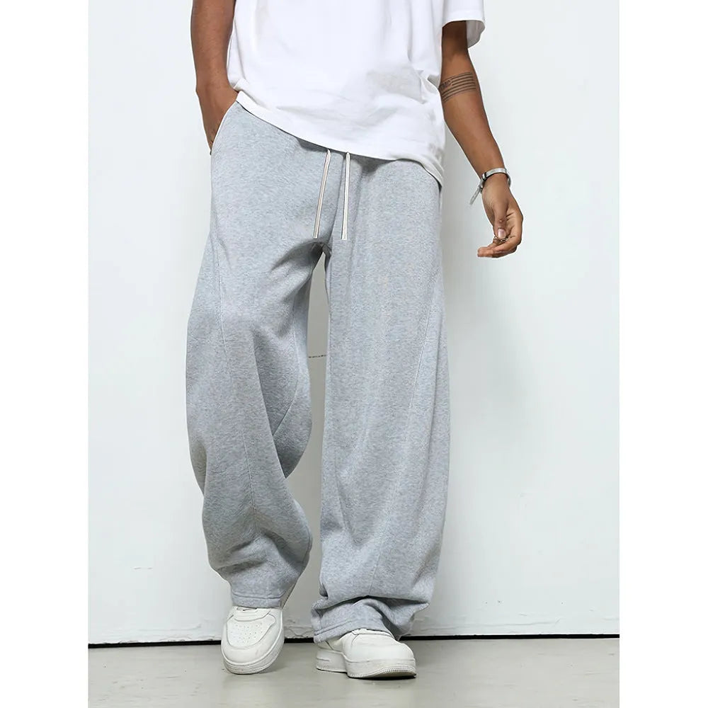 Men's straight-leg casual trousers in black with a micro-elastic drawstring waistband.