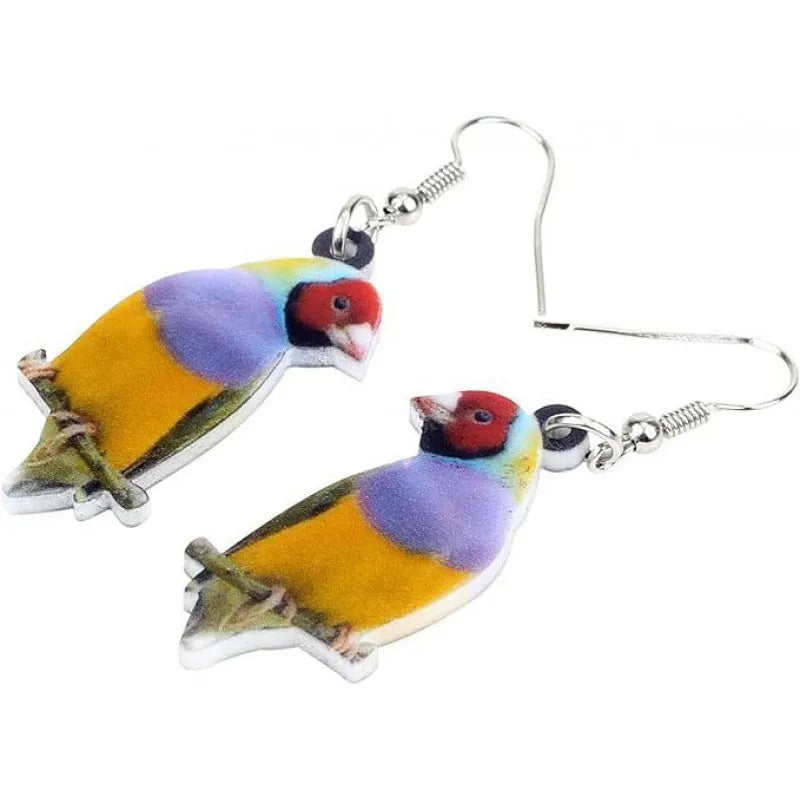Acrylic clip-on earrings with a blue titmouse bird and geometric snake design.