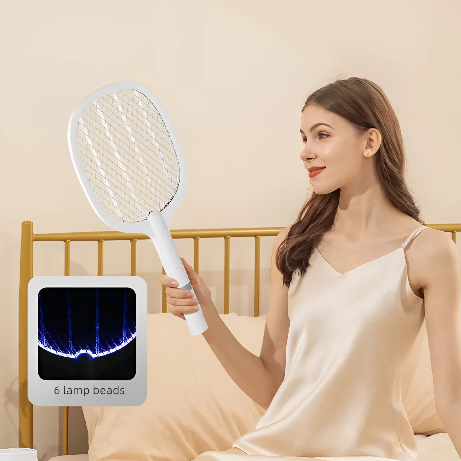 Rechargeable electric mosquito swatter in hand, showing ABS plastic shell and metal grid.