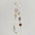 Bohemian style mobile phone charm with beach camera design in island sweetheart colours and alloy construction