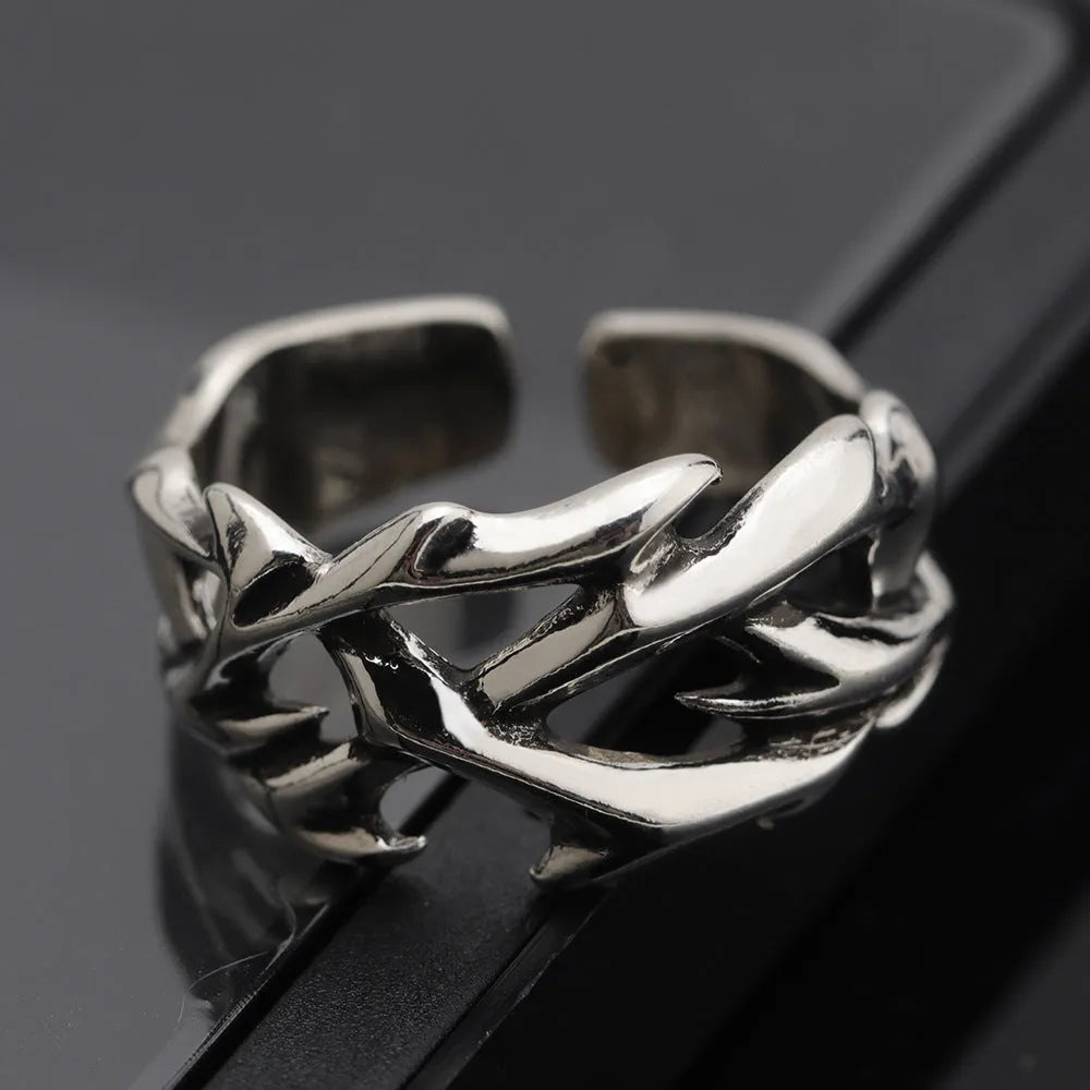 Thorn unisex adjustable copper ring with geometric flower design in J2150 thorns colour