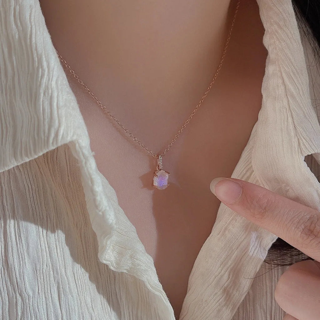 Sterling silver necklace with geometric crystal moonstone pendant on adjustable curb chain
